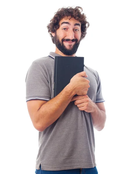 Young crazy man happy with a book — Stock Photo, Image