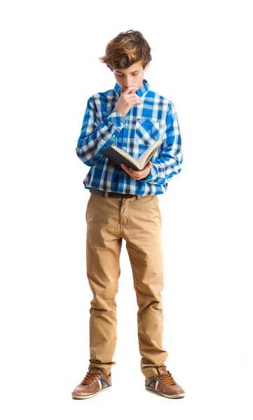 Teenager holding a book — Stock Photo, Image