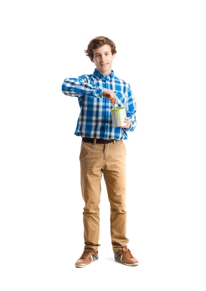 Tonåring håller en färg kan — Stockfoto