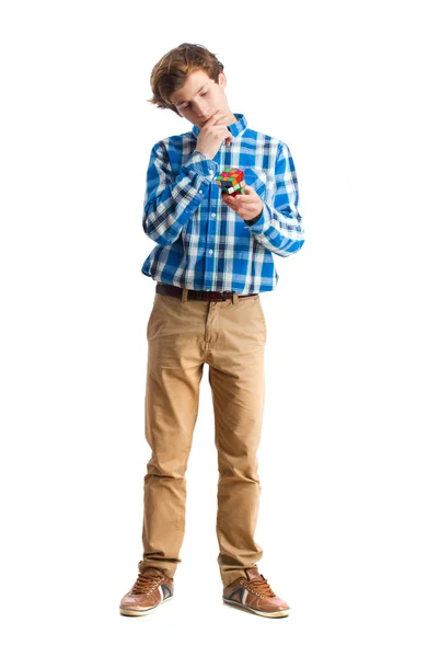 Teenager holding a rubik 's cube — стоковое фото