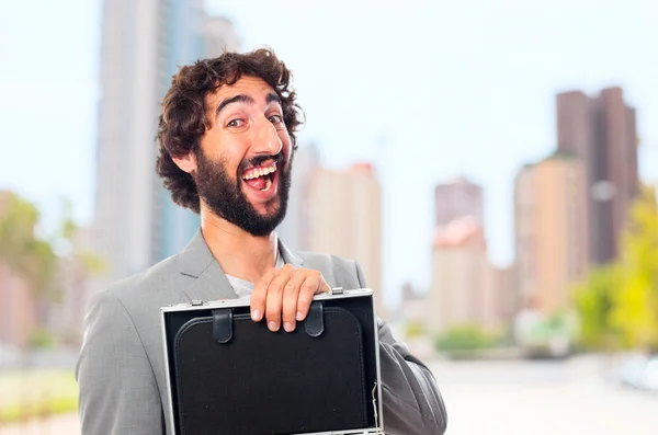 Young crazy man wuth a case — Stock Photo, Image