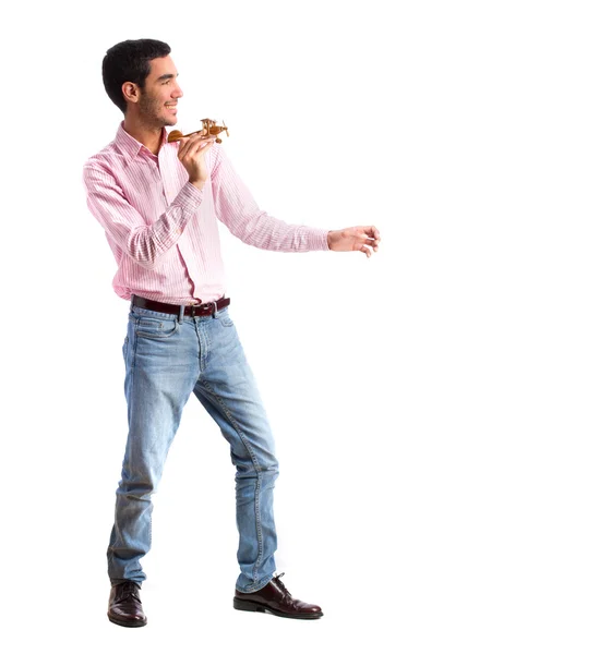 Chico jugando con avión de madera — Foto de Stock