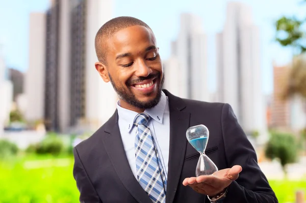 Joven fresco negro hombre con un temporizador — Foto de Stock