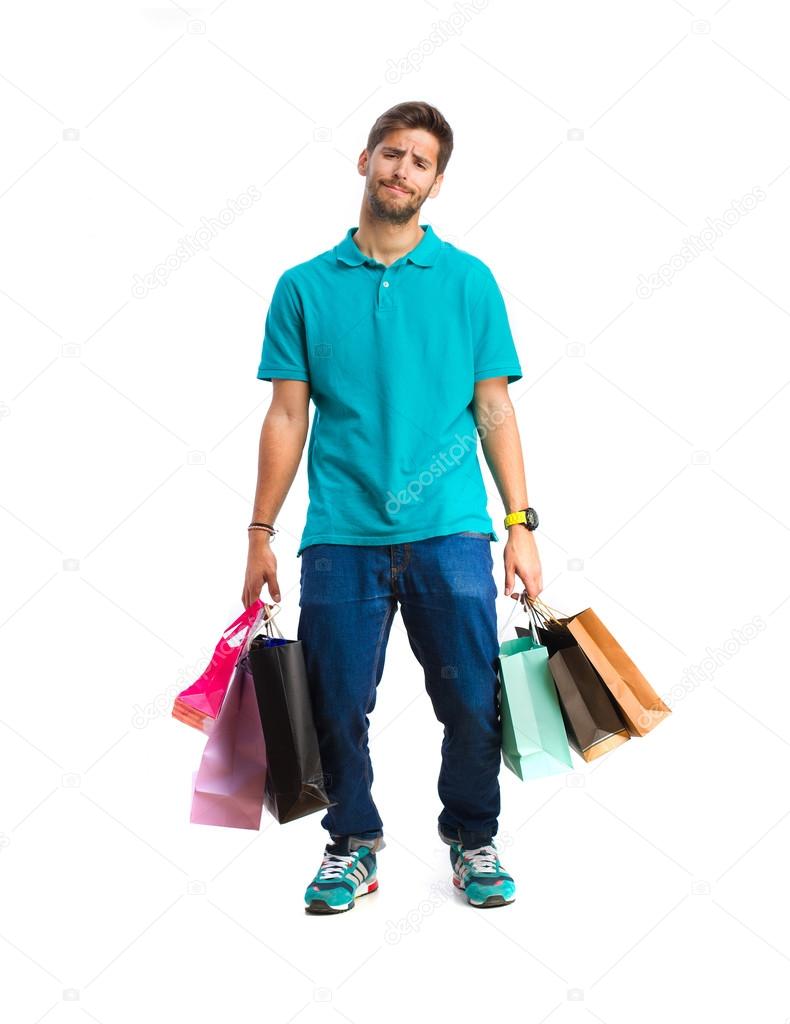 young boy with shopping bags