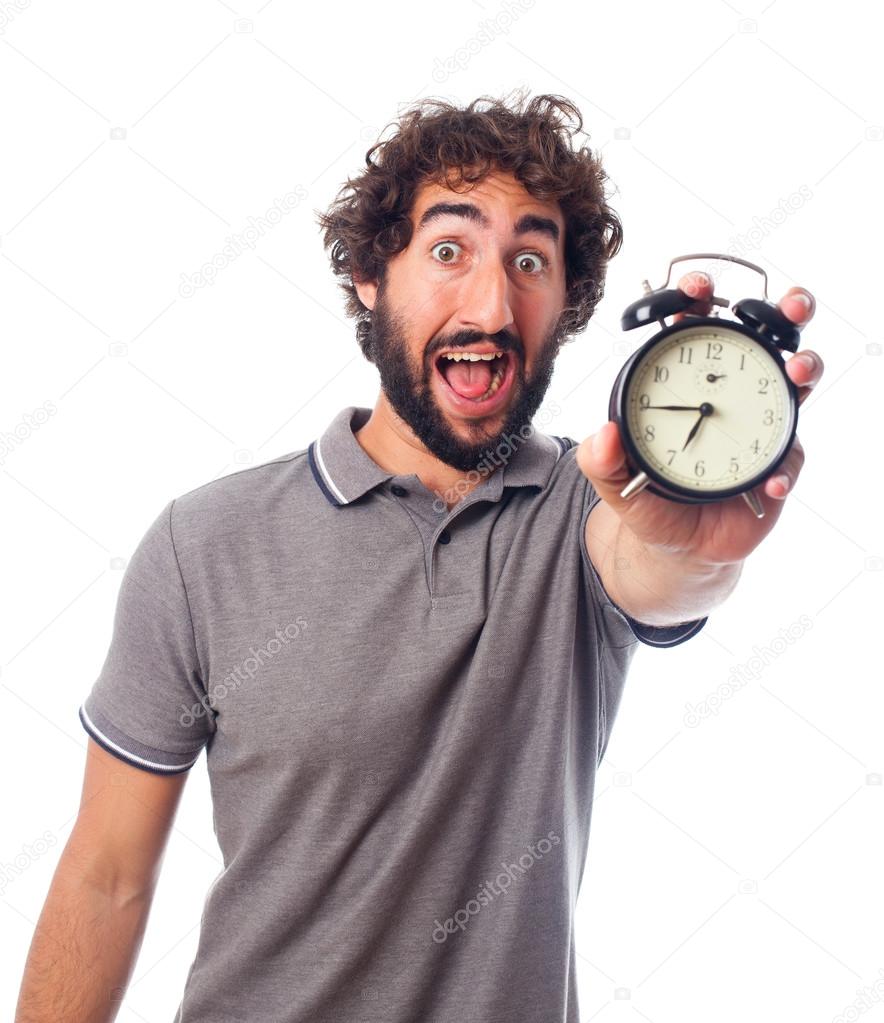 young bearded man with a clock