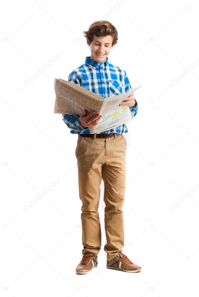 teenager reading a newspaper