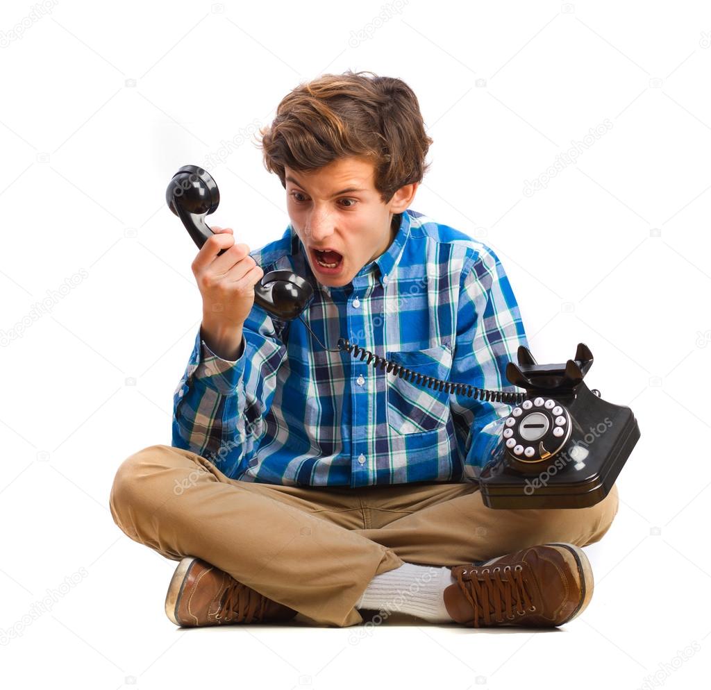 teenager shouting at phone