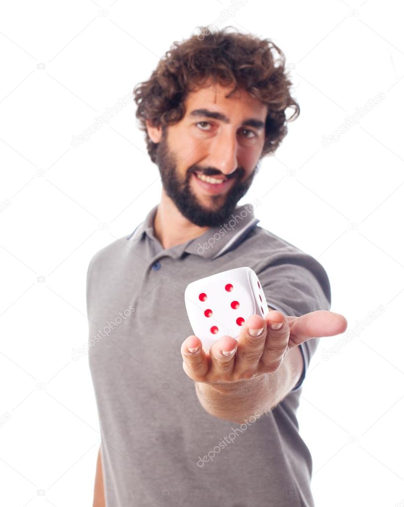 young crazy man offering a dice