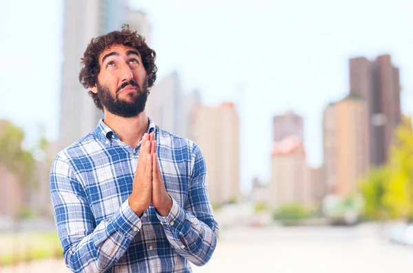 Mladý muž se modlí — Stock fotografie
