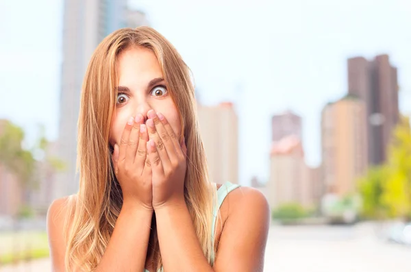 Young cool woman covering her mouth — Stock Photo, Image