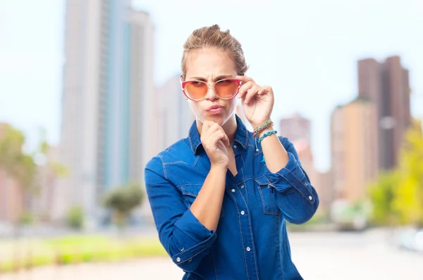 Young cool woman doubting — Stock Photo, Image