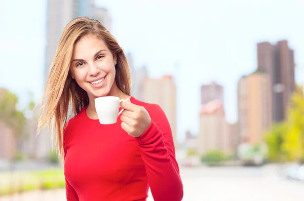 Young cool woman with a coffee cup — Stock Photo, Image