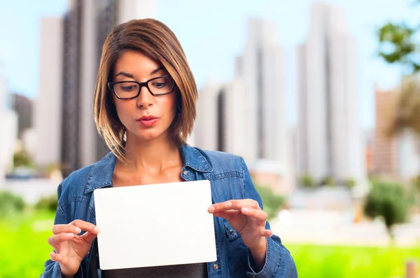 Joven guay mujer con un cartel —  Fotos de Stock