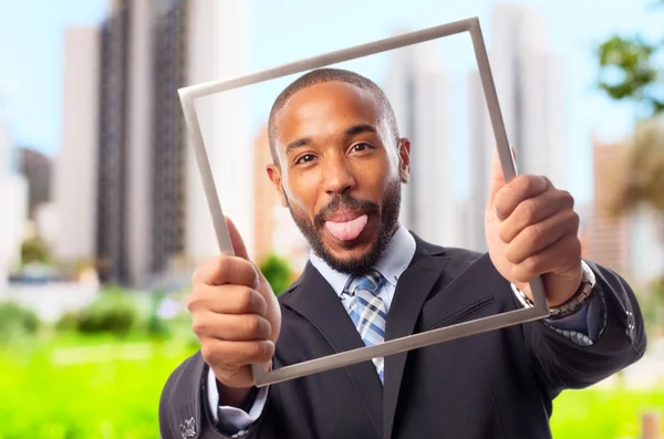 Jonge cool zwarte man met een stalen frame een grapje — Stockfoto