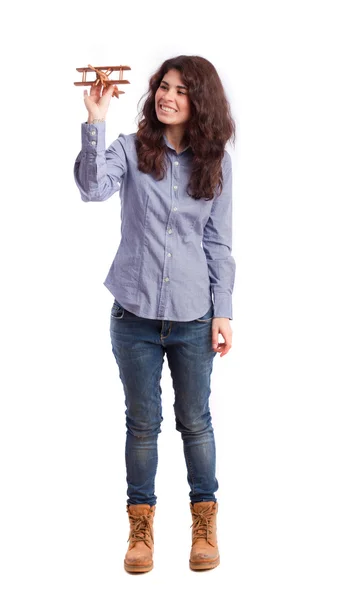 Dreamer girl with a wood plane — Stock Photo, Image