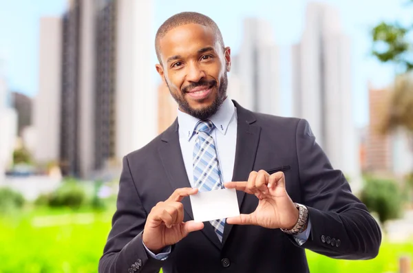 Joven fresco negro hombre con tarjeta de nombre — Foto de Stock