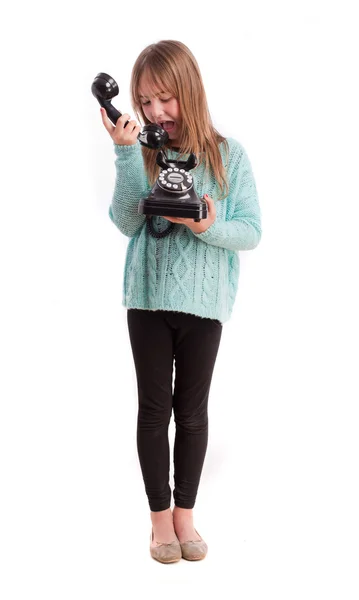 Young girl with a telephone — Stock Photo, Image