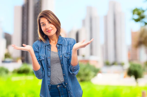 Young cool woman confused — Stock Photo, Image