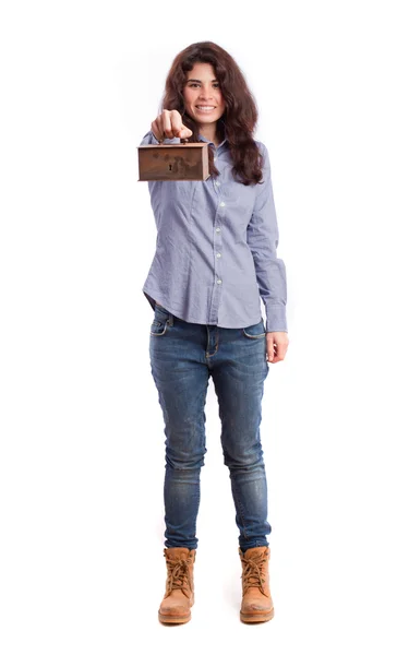 Happy girl holding a strongbox — Stock Photo, Image