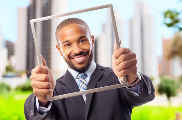 Jonge cool zwarte man met een stalen frame — Stockfoto