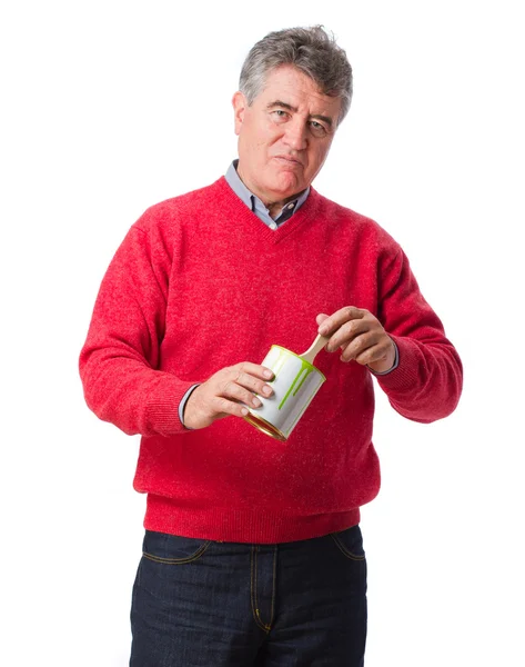 Adult holding a paint can — Stock Photo, Image