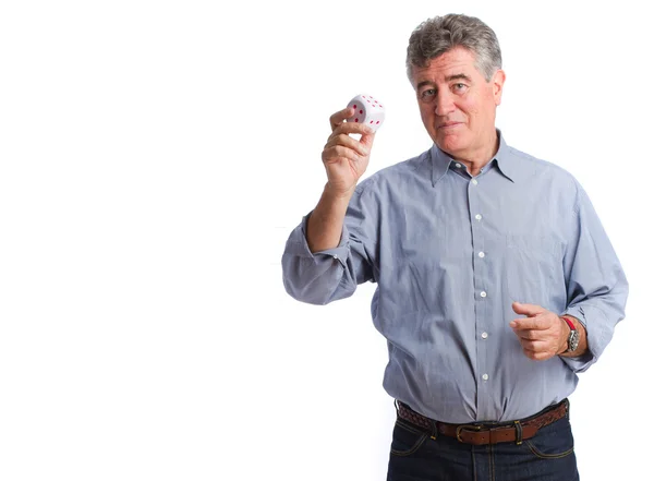 Happy man holding a die — Stock Photo, Image