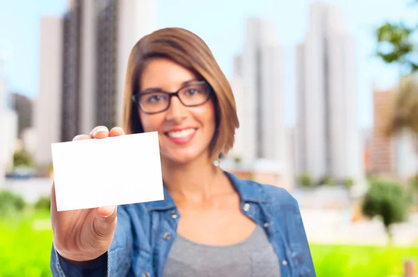 Young cool woman with name card — Stock Photo, Image