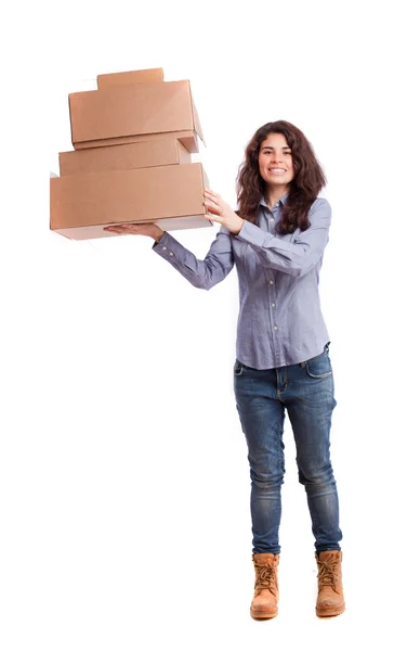 Menina satisfeita segurando uma caixas de papelão — Fotografia de Stock