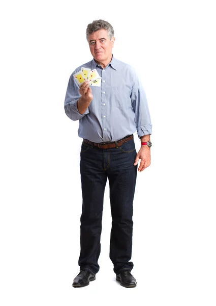 Satisfied man holding a cards — Stock Photo, Image