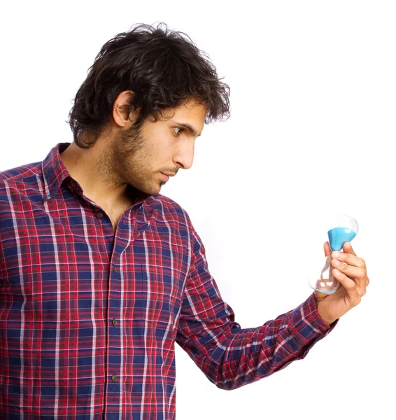 Hindu cool young man with hourglass — Stock Photo, Image