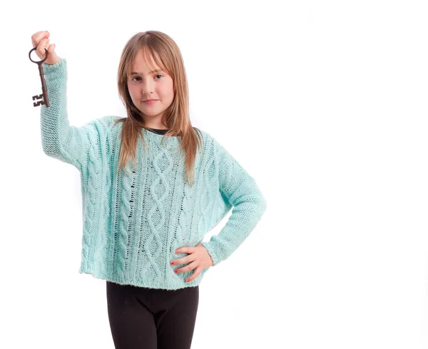 Young girl with a key — Stock Photo, Image