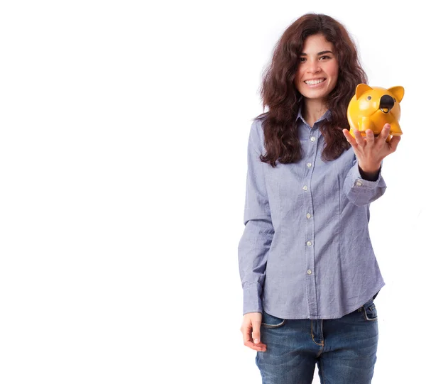 Happy girl holding a piggy bank — Stock Photo, Image