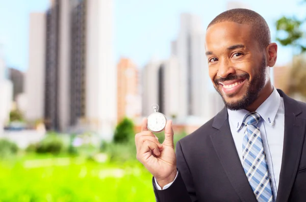 Joven fresco negro hombre con un temporizador — Foto de Stock