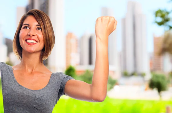 Joven cool mujer celebrando signo —  Fotos de Stock