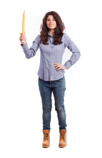 Satisfied girl holding a pencil — Stock Photo, Image