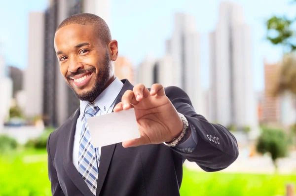 Joven fresco negro hombre con tarjeta de nombre — Foto de Stock