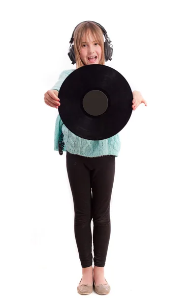 Ung flicka hörlurar och vinyl — Stockfoto