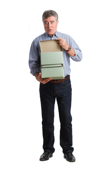 Surprised man opening a boxes — Stock Photo, Image