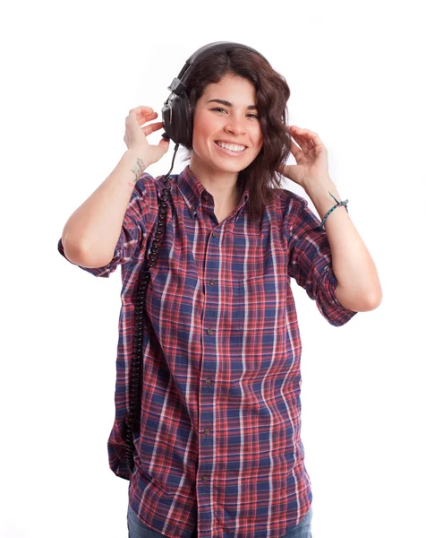 Chica divertida escuchando música con auriculares —  Fotos de Stock