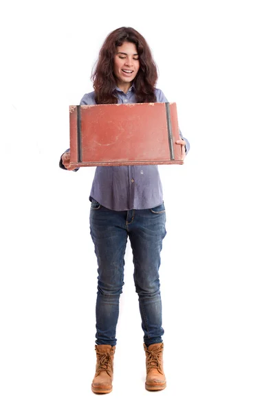 Verrast meisje een lederen portefeuille openen — Stockfoto