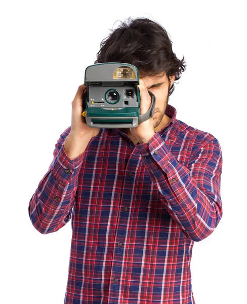 Hindoe cool jonge man met een camera — Stockfoto