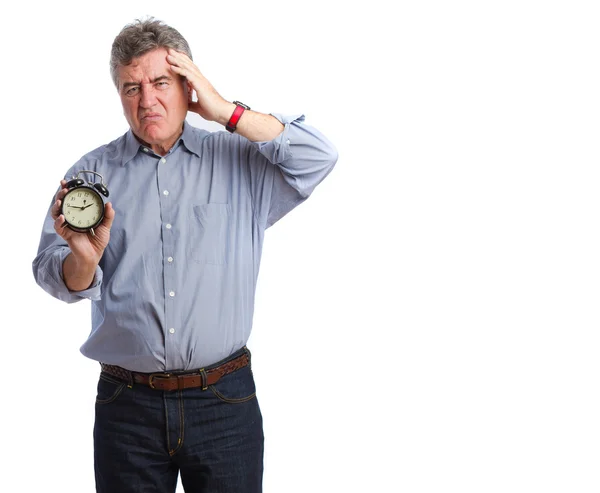 生气的人抱着一台闹钟。 — 图库照片
