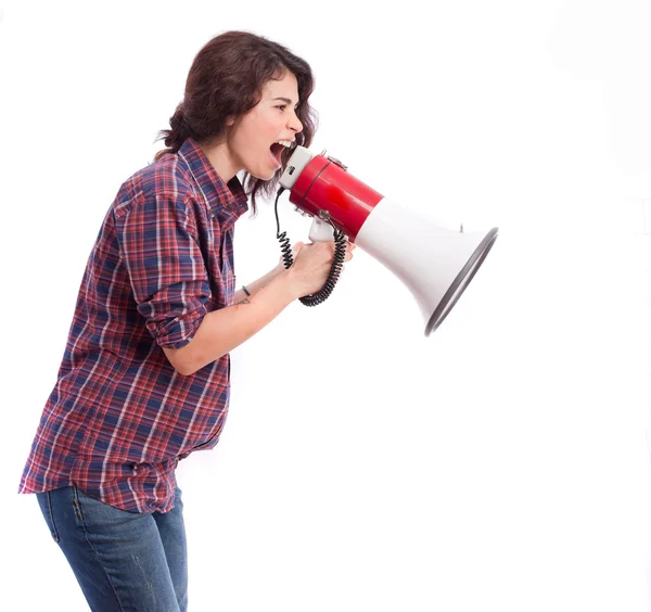 Angry girl shouting with a megaphone — Stock Photo, Image