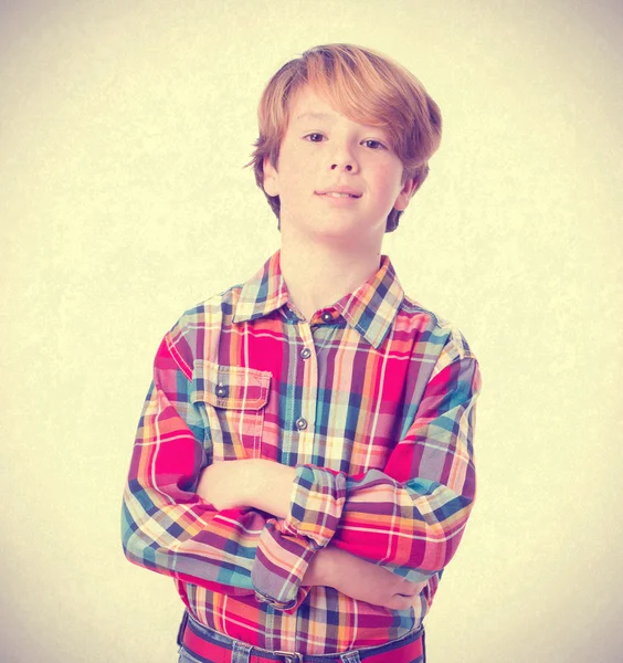 Pensive boy with arms crossed — Stock Photo, Image