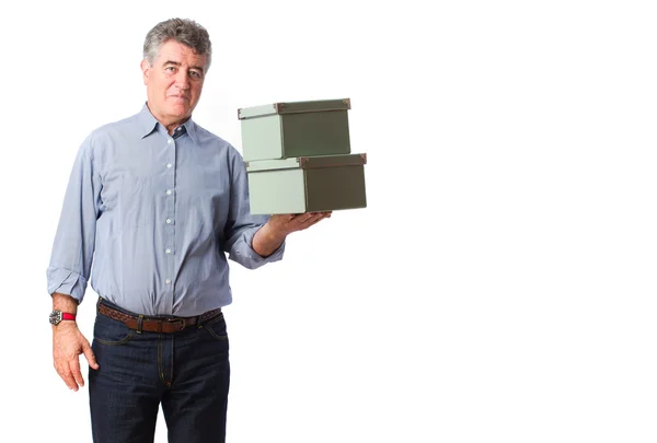 Adulto sosteniendo cajas — Foto de Stock