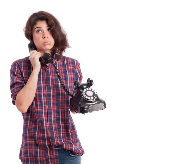 Telefonla konuşurken sıkılmış kız — Stok fotoğraf