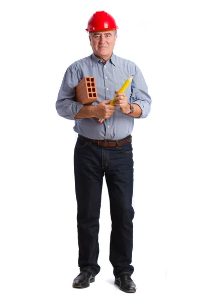 Happy man holding a pencil and a brick — Stock Photo, Image