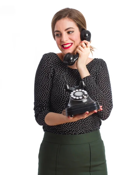 Young girl with a telephone — Stock Photo, Image