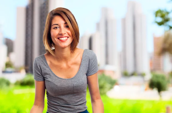 Young cool woman smiling — Stock Photo, Image