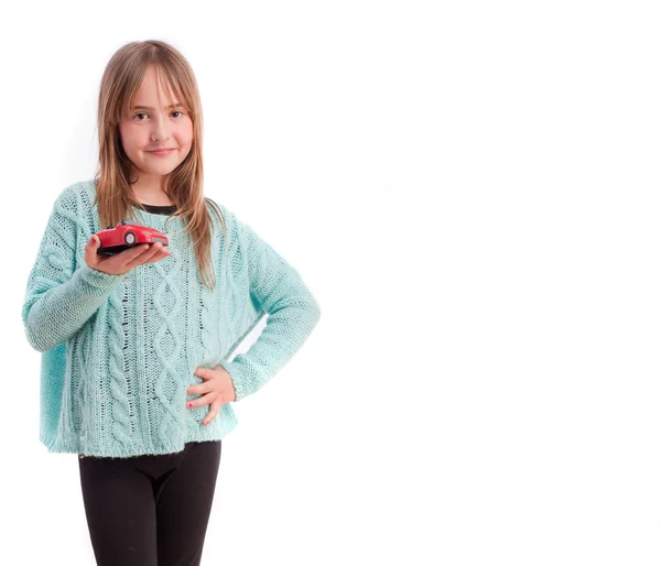 Young girl with a car toy — Stock Photo, Image